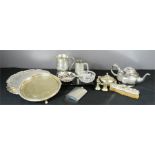 A quantity of silver plateware including a teapot, wine trays, tankards, hip flask etc.