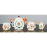 A three piece 'Fox Hunt' tea set; tea pot, sugar, milk jug and similar jug. (4)