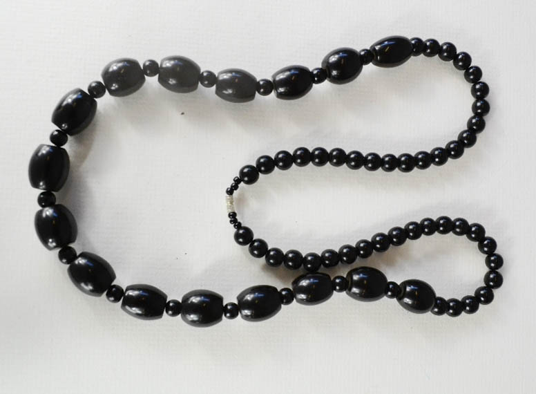 A jet beaded necklace.