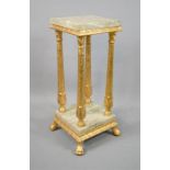 A giltwood and marble jardinere stand.