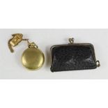 An antique leather coin purse, and brass coin holder.
