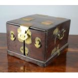 A Chinese dressing box, with folding mirror, and two doors opening to reveal banks of drawers.