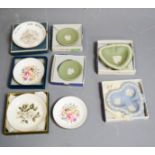 A group of Wedgwood and Royal Worcester boxed trinket dishes.