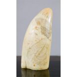 A 19th century 'Scrimshaw' type whale tooth, depicting a male profile portrait on one side, 17cm