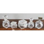A set of Czechoslovakian cut glass dressing table set of faceted design; five in total.