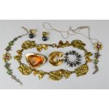 A quantity of jewellery to include necklaces, brooch, earrings etc.