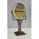 An Art Nouveau dressing table mirror, oval form, 26cm high.