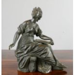 A bronze classical figure of a lady.