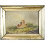 An 18th century oil on copper depicting a landscape with castle in the background and figure to