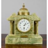 An agate mantle clock by Dent, 33 Cockspur Street, London, with arabic dial, gilt metal mounts and