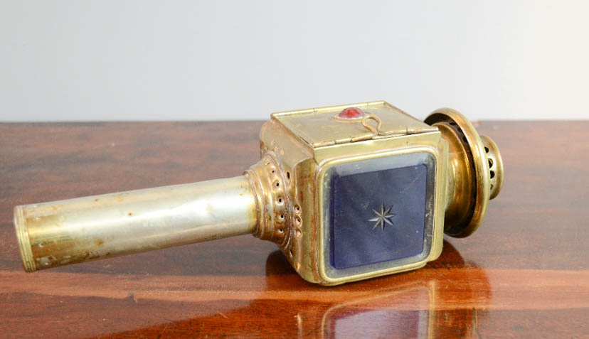 A Victorian brass carriage lamp, no 164, with blue etched glass plate.