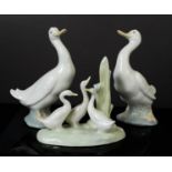 A set of three Nao Lladro ducks and ducklings.