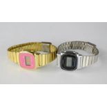 A Casio stainless steel wristwatch, together with a Casio style watch with pink face, and