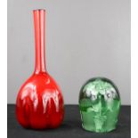 A green glass dump, together with a red Swedish bud vase.