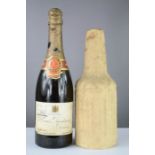 A 1928 Louis Roederer Reims, Extra Dry Champagne, together with original dust cover.
