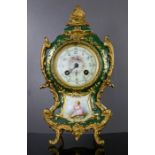 A French 19th century porcelain mantle clock, hand painted dial, makers mark stamped to the