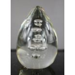 A glass paperweight, bubble interior, 11cm high.