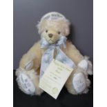 A Coburg German teddy bear no 311, commemorating Happy New Year 2000, mohair, original tag.