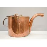 A 19th century copper vessel with spout.