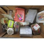 A group of tins and ephemera.