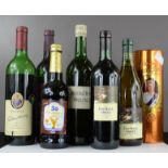 A group of wines to include Hardys, Mulled wine, Ale, and other bottles.