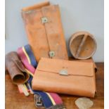 A collection of vintage leather bags and accessories, including cap box.