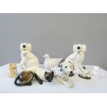 A pair of Staffordshire dogs pair of Country Artists penguin, stoat, Dalmatian, cat and pigeon and