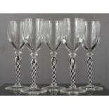 Five air twist stem crystal glasses.