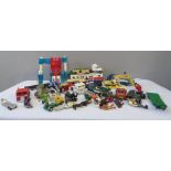 A group of model cars and transporter carriers, including Robots, Matchbox, JCB etc.