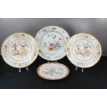 Four Chinese polychrome plates and dishes, the largest depicting a cricket and measures 29cm.