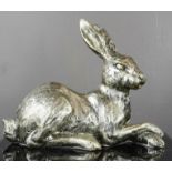 A model seated hare, 17cm high.