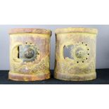 A pair of terracotta wall candle holders with pierced impression of the sun and moon, 22 by 16 by