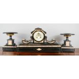 A late Victorian slate mantle clock garniture, inset with marble a Roman Numeral dial, visible
