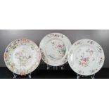 Three late 18th Chinese plates, one enamelled with goats, the others with floral designs, 23cm