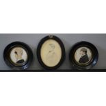 Three Victorian silhouette portraits, two in circular frames.