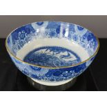 A blue and white bowl depicting swans to the interior, 27½cm diameter.