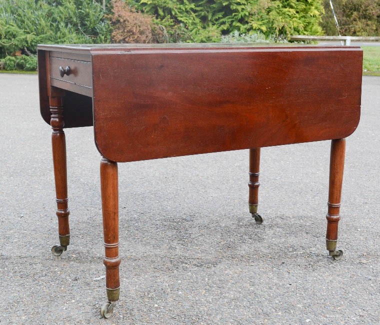 A 19th century mahogany drop leaf tea / pembroke table.