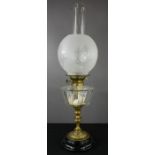 A Victorian oil / paraffin lamp, with etched opaque globular shade and inner funnel, 68cm high.