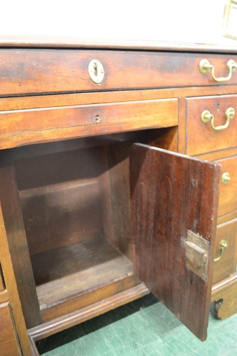 A George III mahogany kneehole desk, with recessed cupboard door flanked by drawers, 80 by 89 by - Image 3 of 3