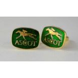 A pair of Ascot cufflinks.