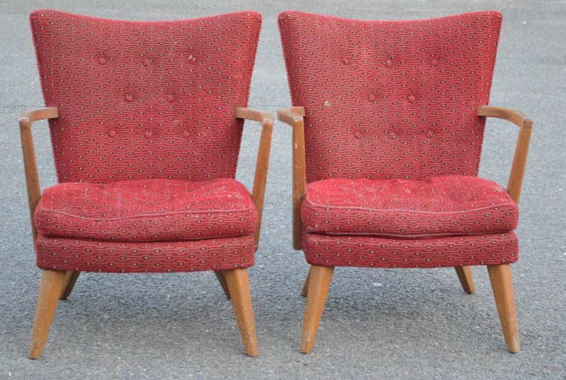 A pair of 1950s chairs in original red upholstery.