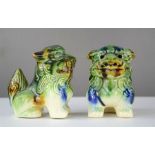 A pair of ceramic Chinese dogs of fo, 9cm high.
