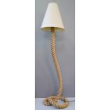 A Nautical theme rope standard lamp with cream shade.