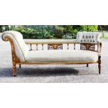 A Victorian mahogany inlaid chaise longue.