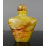 A Chinese Heitian polished jade snuff bottle and stopper.