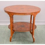 A 19th century French painted occasional table, with oval top and mid shelf, 66 by 76 by 54cm.