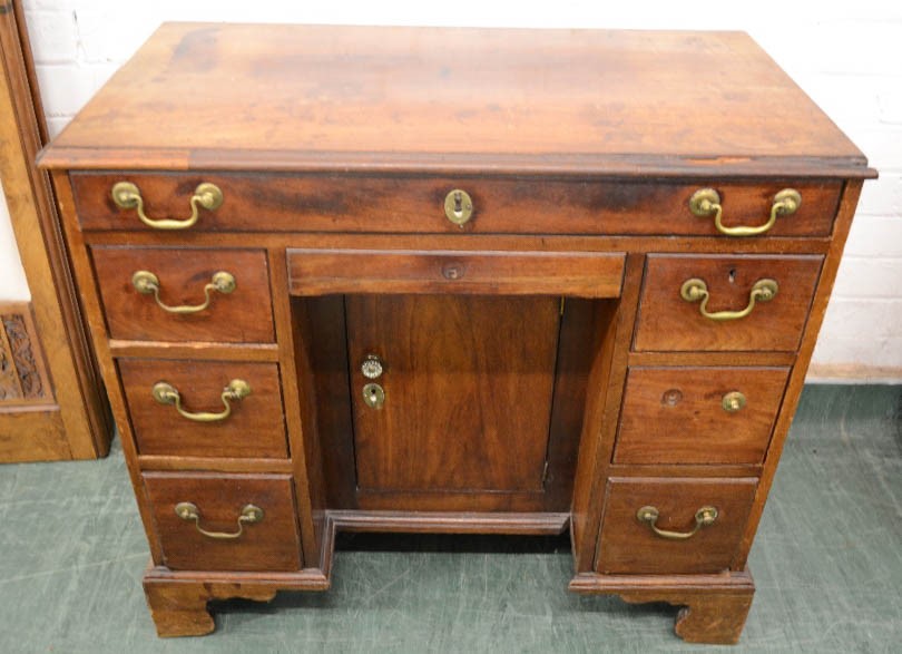 A George III mahogany kneehole desk, with recessed cupboard door flanked by drawers, 80 by 89 by - Image 2 of 3