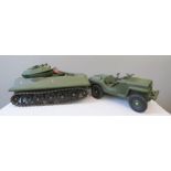 A model army tank, and an Asbro Landrover.