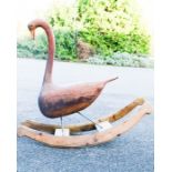 A rocking swan, hand carved.