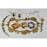 A quantity of jewellery to include necklaces, brooch, earrings etc.